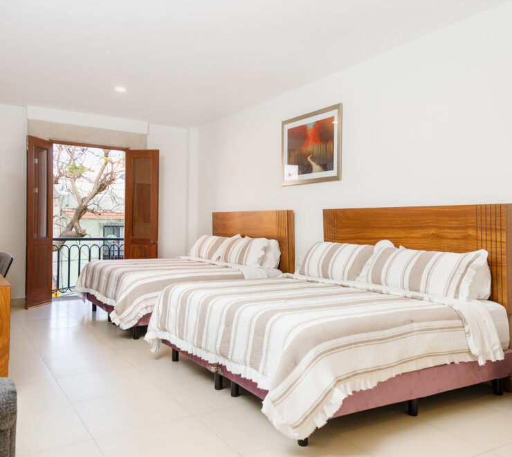 7 Habitación Delux con balcón (Cuádruple)